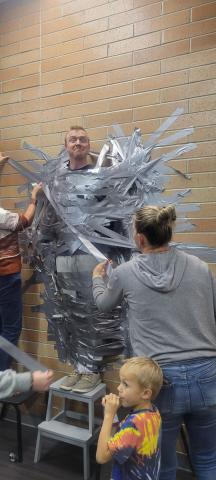 mr moss duct taped to wall