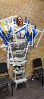 mrs hansen duct taped to wall