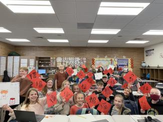 6th grade afternoon class with red signs